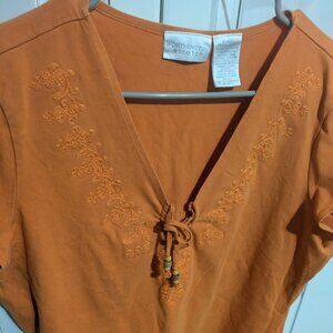 Women's pretty orange blouse.